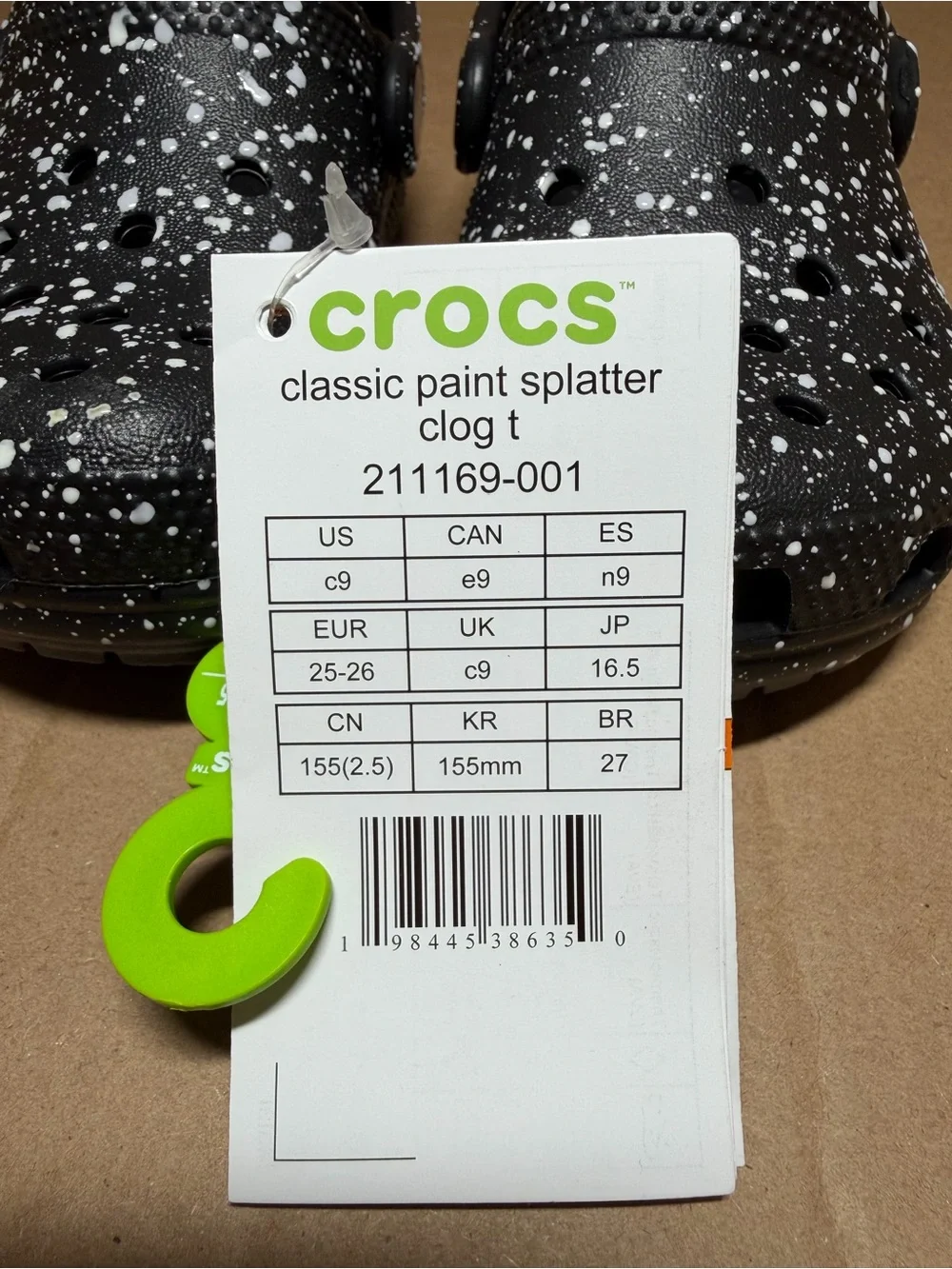 CROCS Kids' Classic Clog in Black with White Paint Splatter